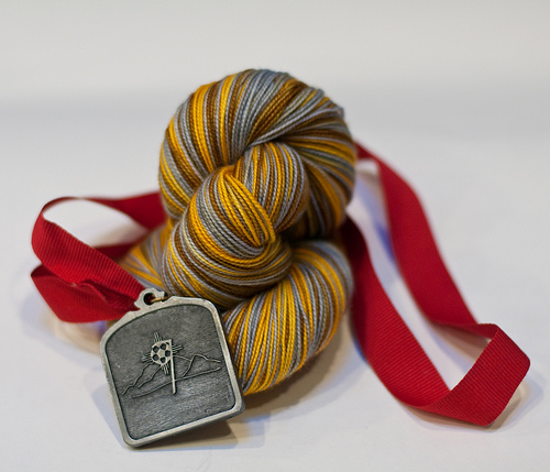 win a hank of Olympic Medals Yarn!